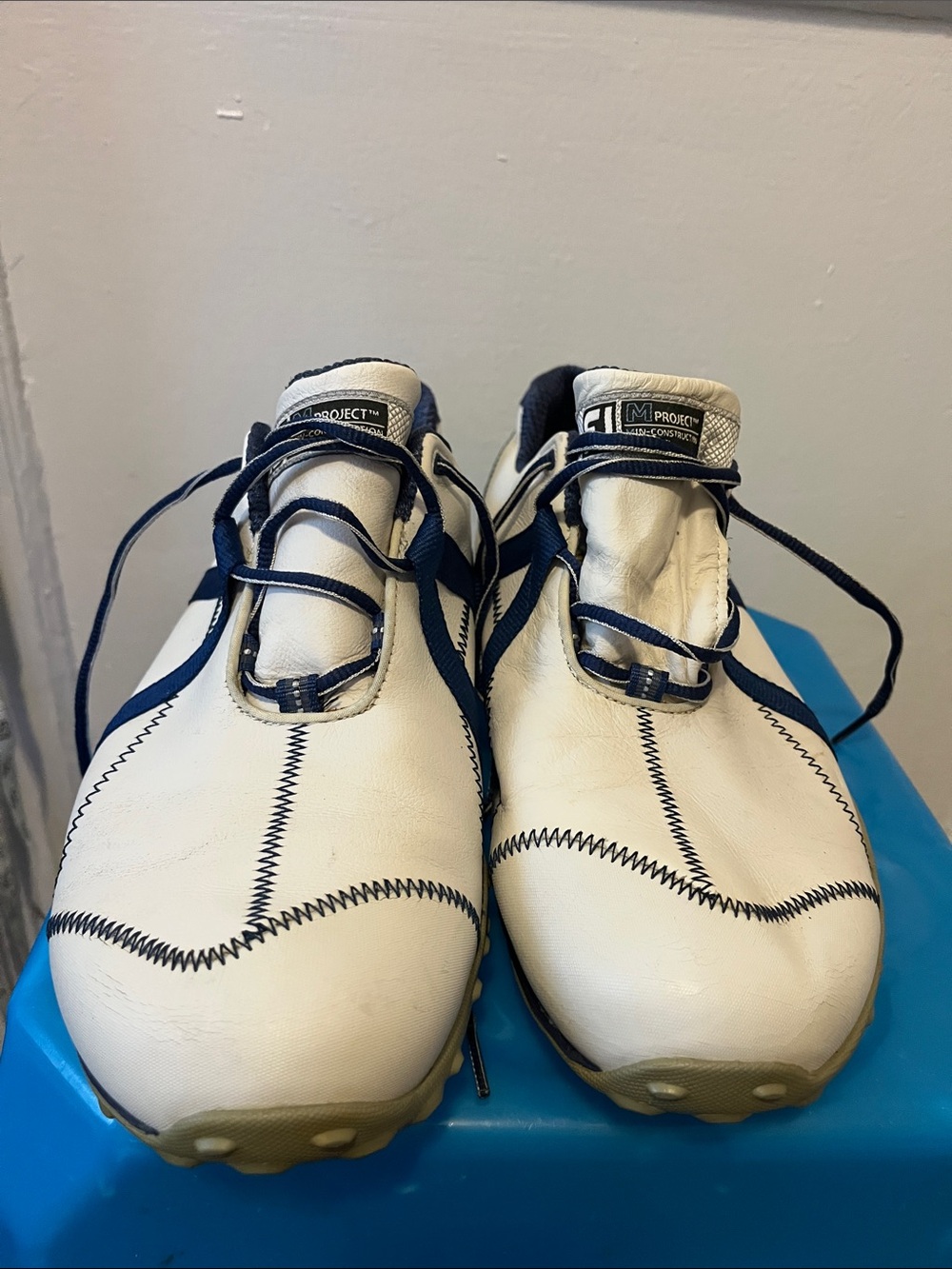 Men's White Athletic Shoes with Navy Accents